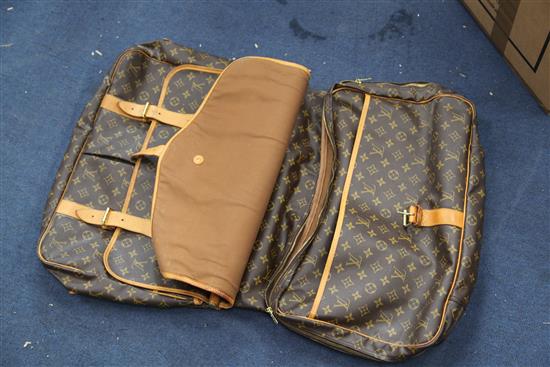 A large Louis Vuitton suitcase, 21in.